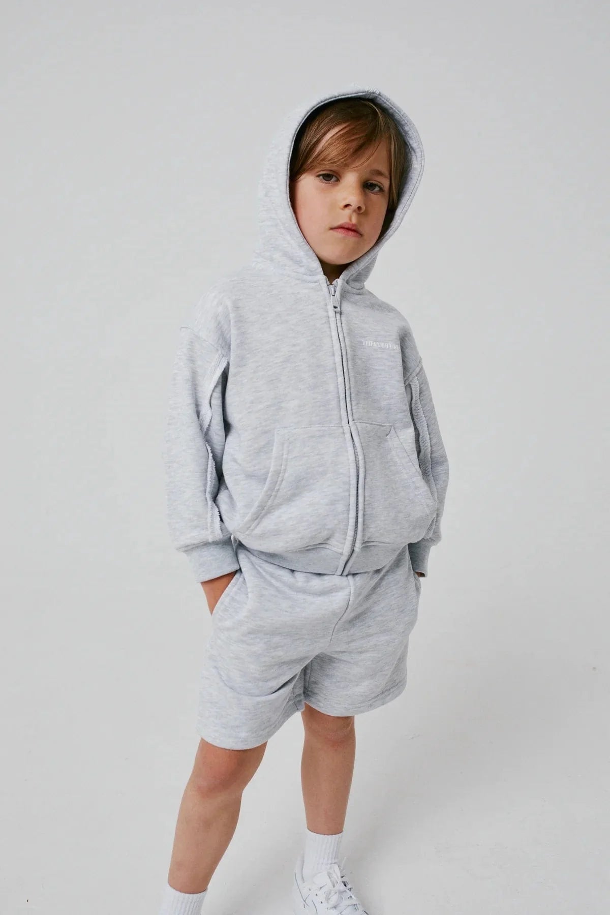 The Couture Club Kids Raw Seam Shorts in Grey