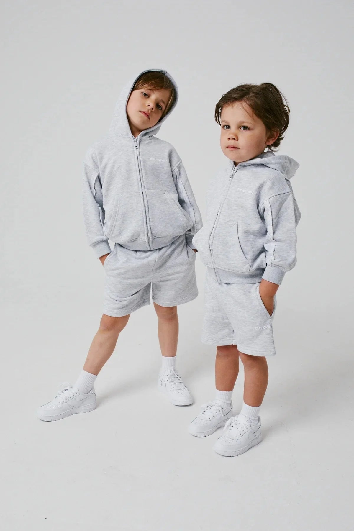 The Couture Club Kids Raw Seam Members Only Zip Up in Grey