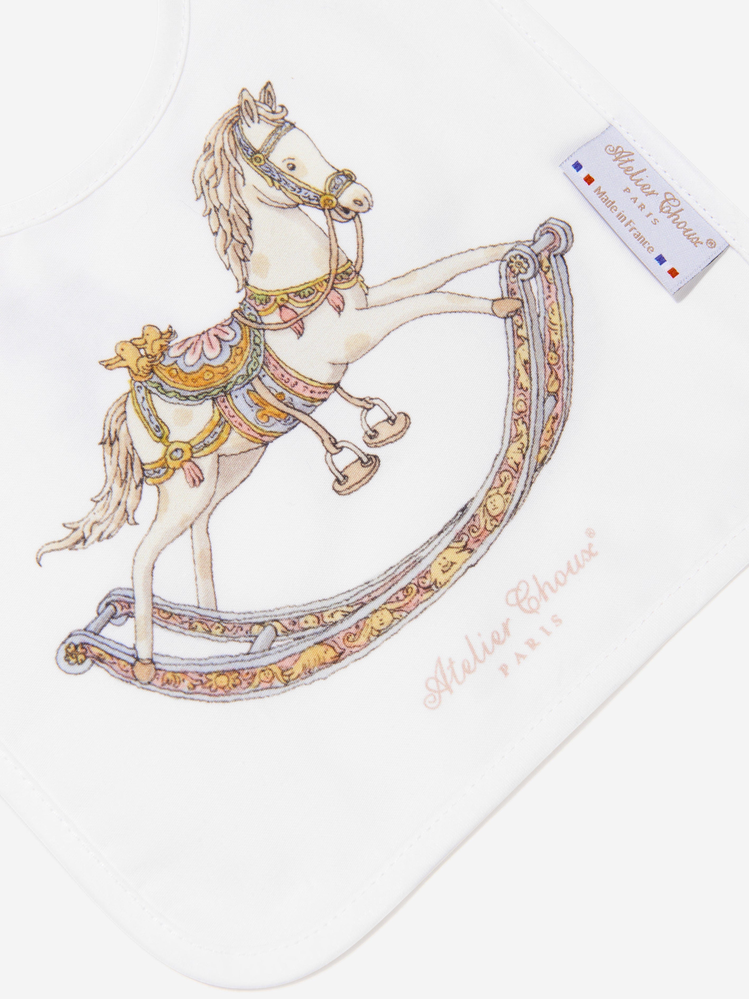 Atelier Choux Baby Rocking Horse Satin Bib in White