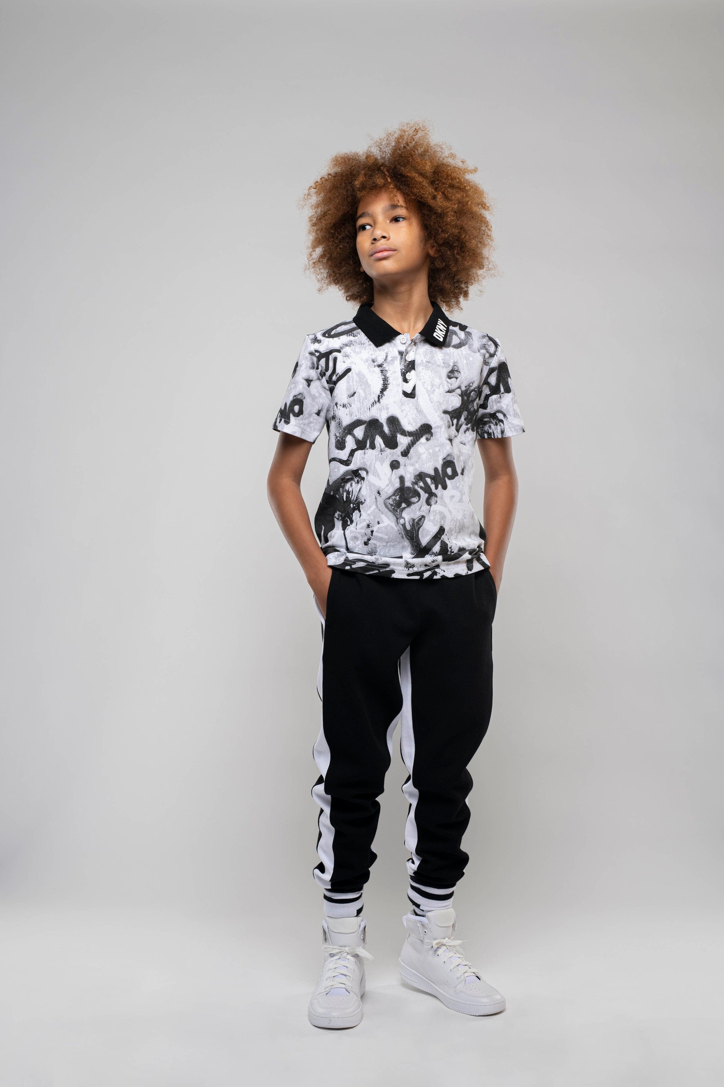 DKNY Boys Graffiti Polo Shirt in White