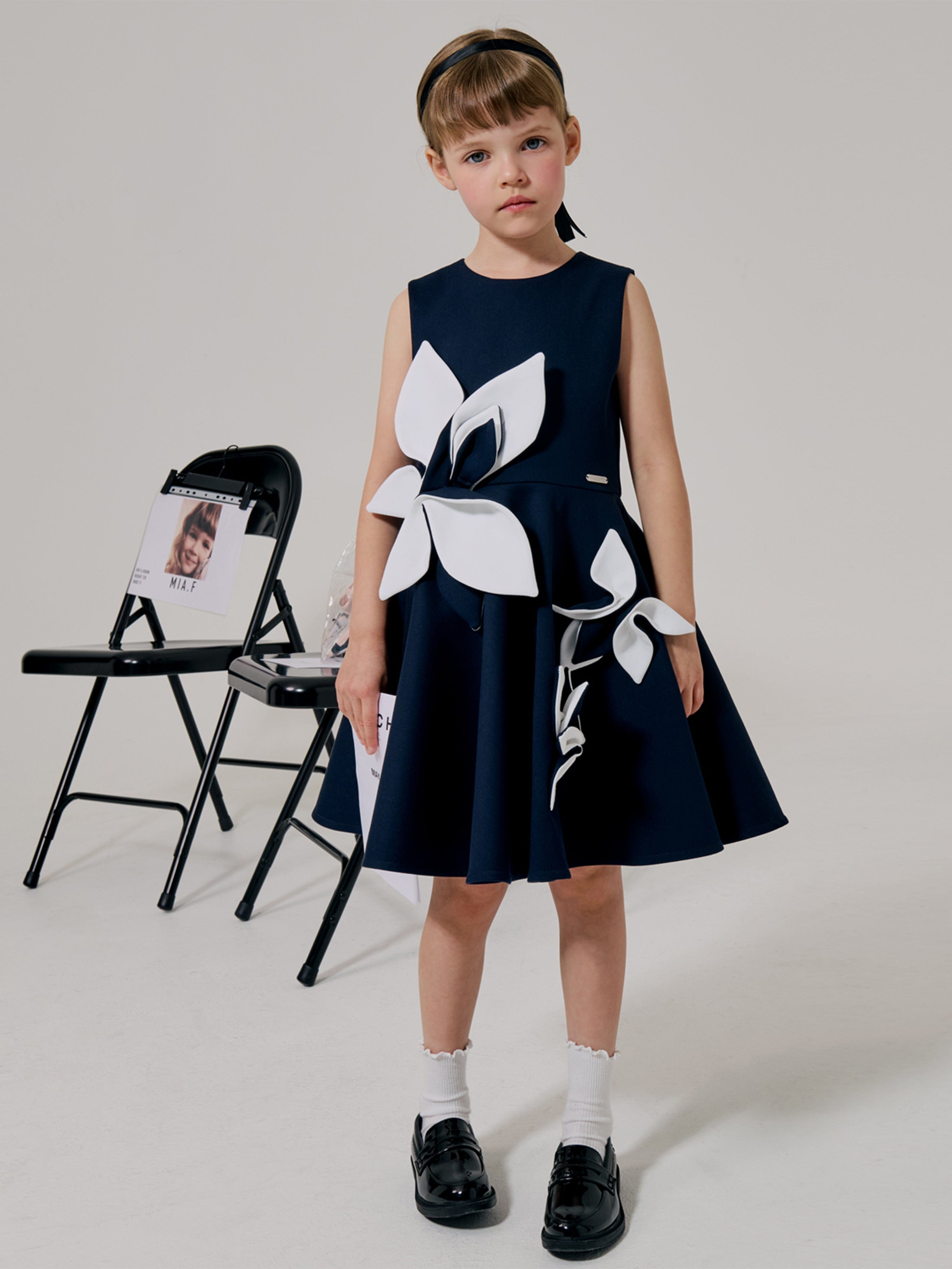 Jessie And James Girls Magnolia Sleeveless Dress in Navy