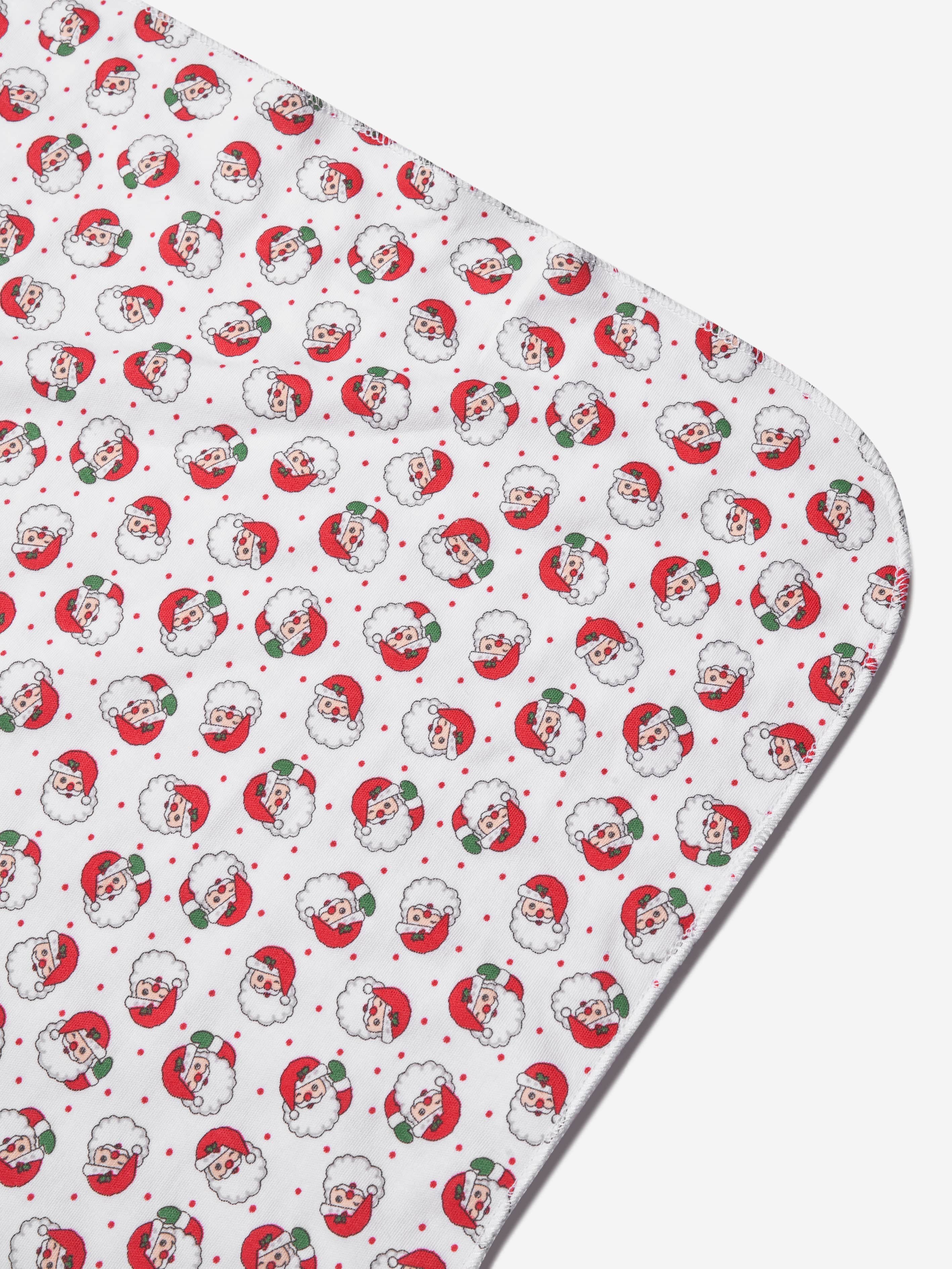 Magnolia Baby Baby Winking Santa Printed Swaddle Blanket in Red