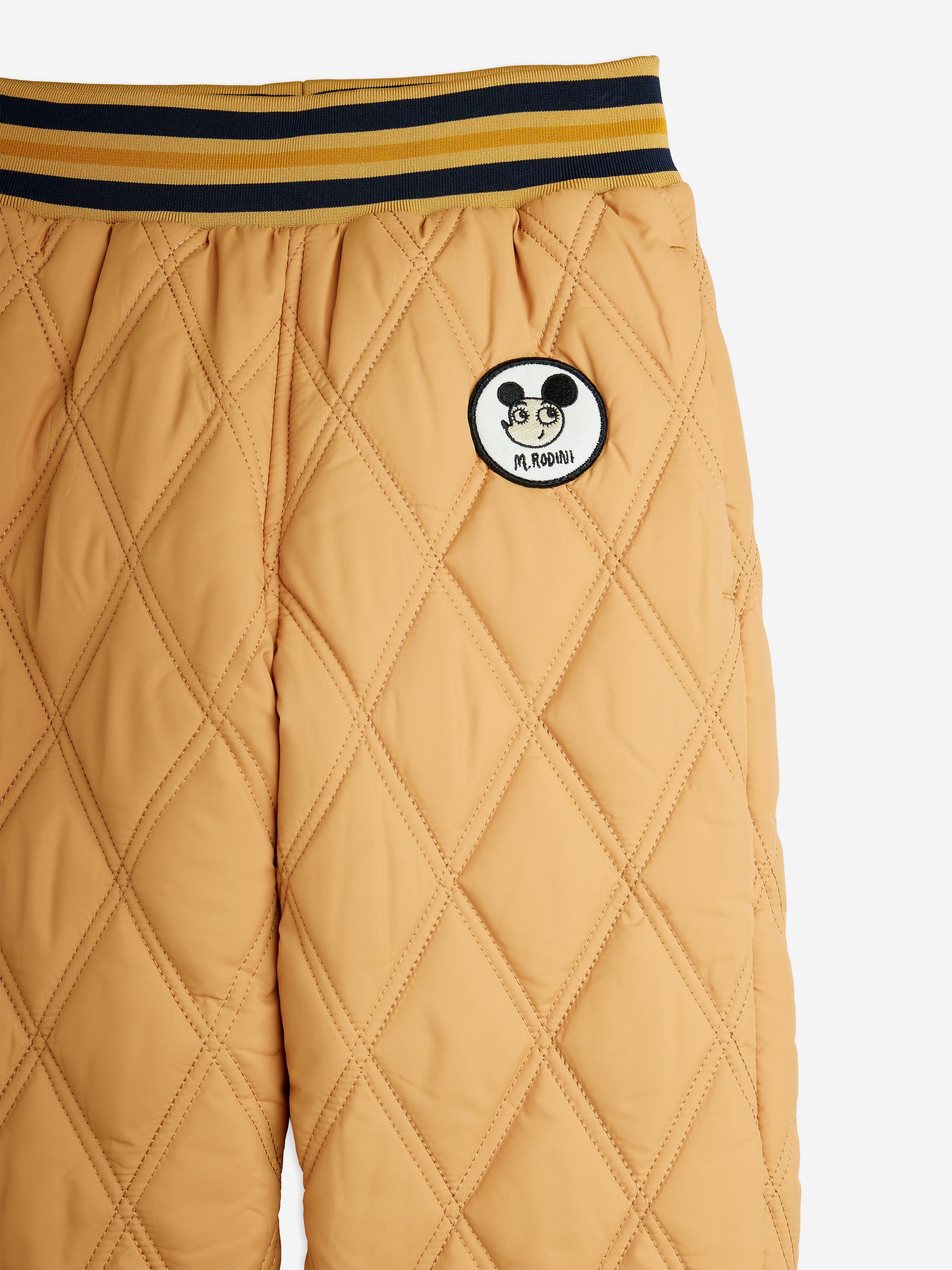 Mini Rodini Kids Ritzratz Patch Quilted Trousers in Beige