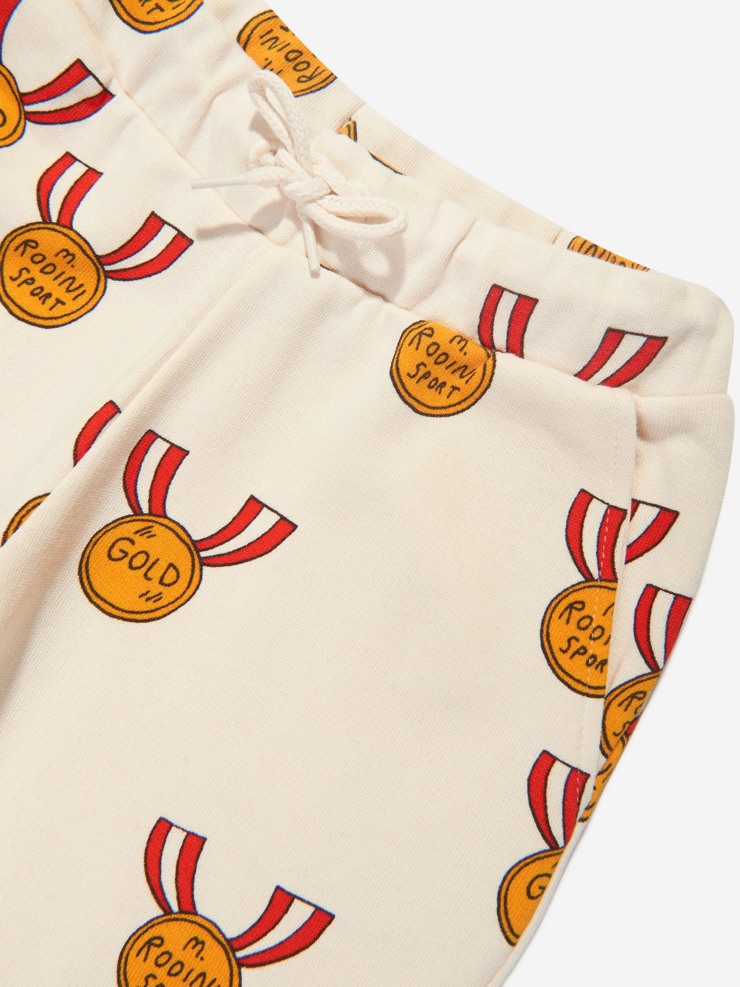 Mini Rodini Girls Medals Print Joggers in Cream