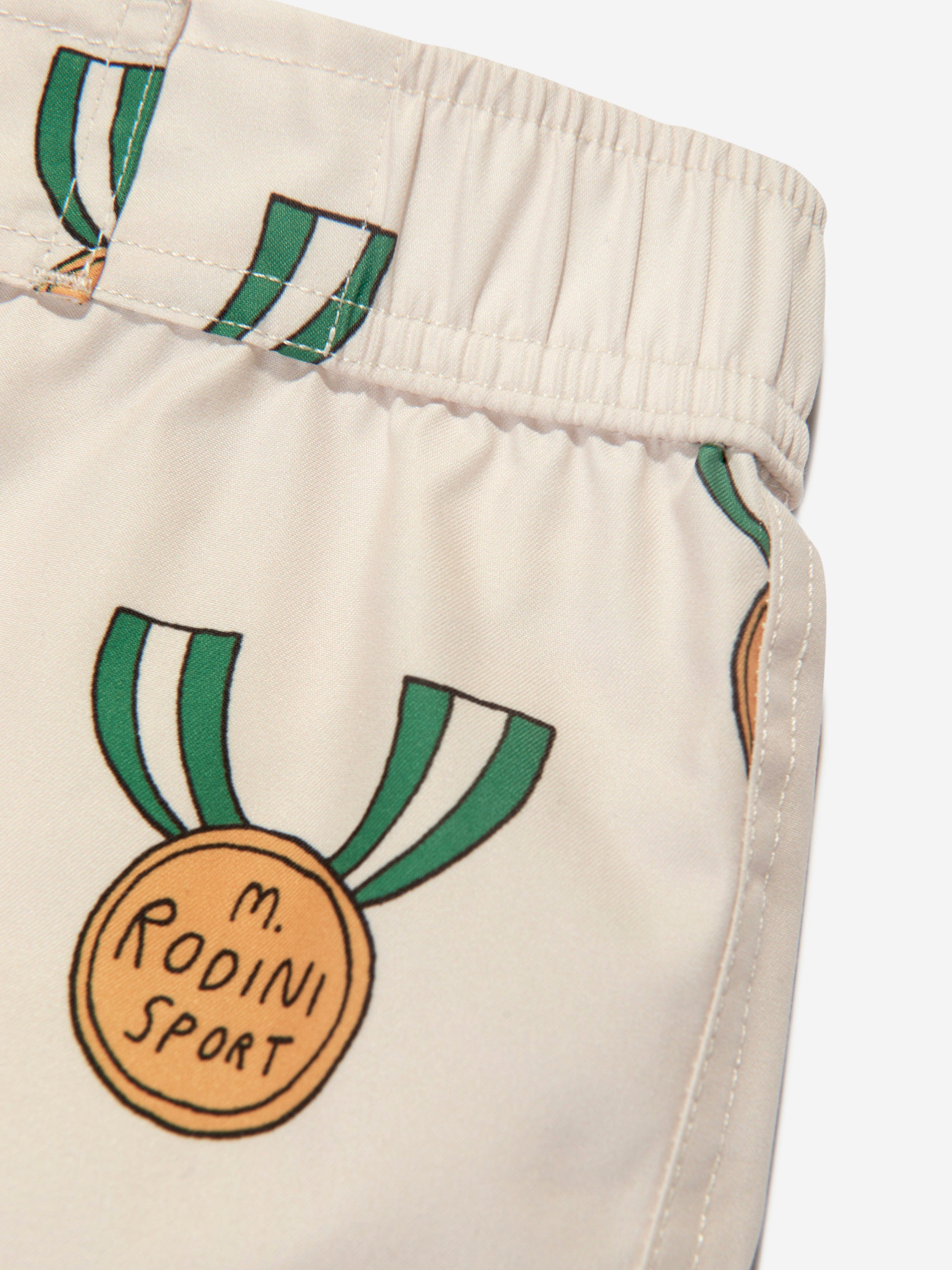 Mini Rodini Boys Medals Print Swim Shorts in Ivory