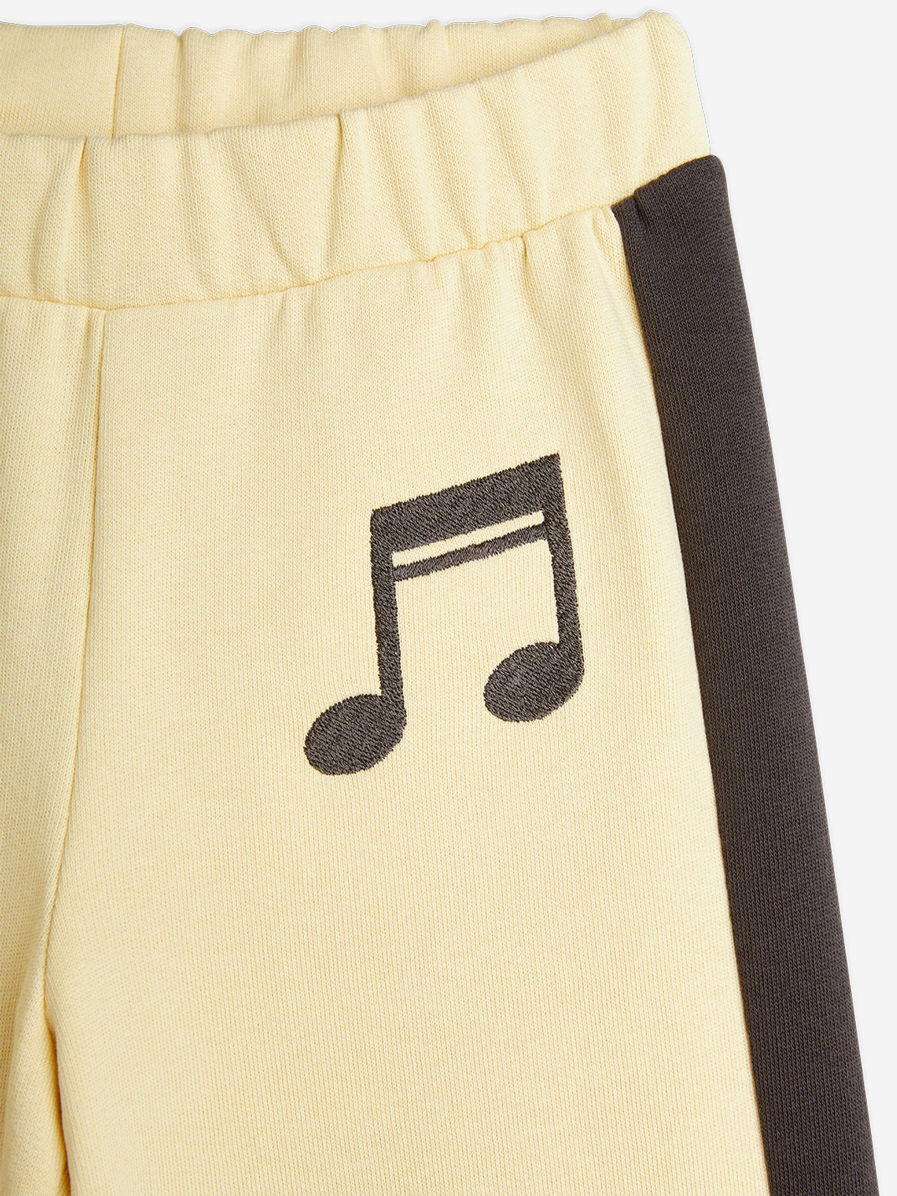 Mini Rodini Girls Note Embroidered Joggers in Yellow