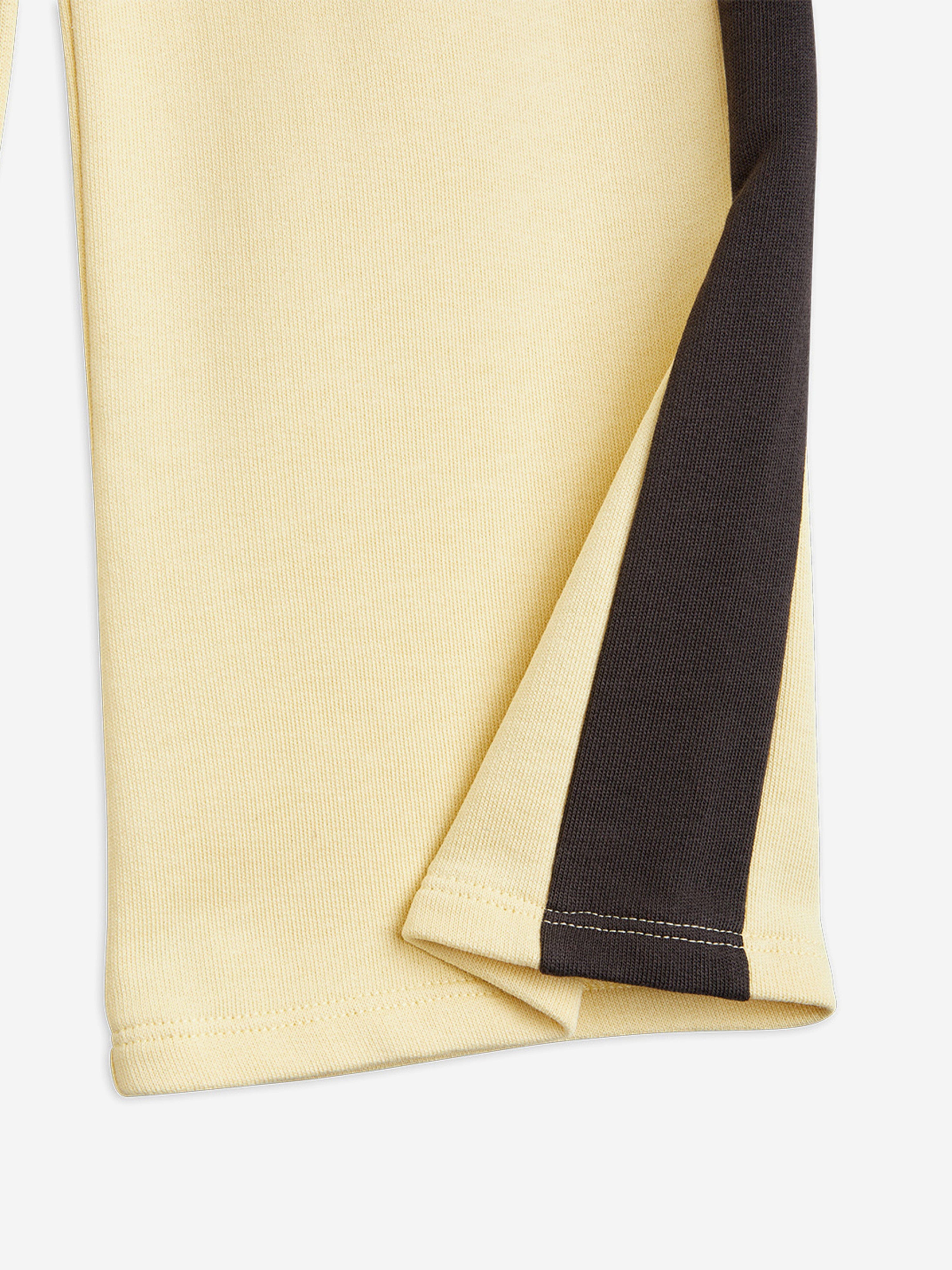 Mini Rodini Girls Note Embroidered Joggers in Yellow