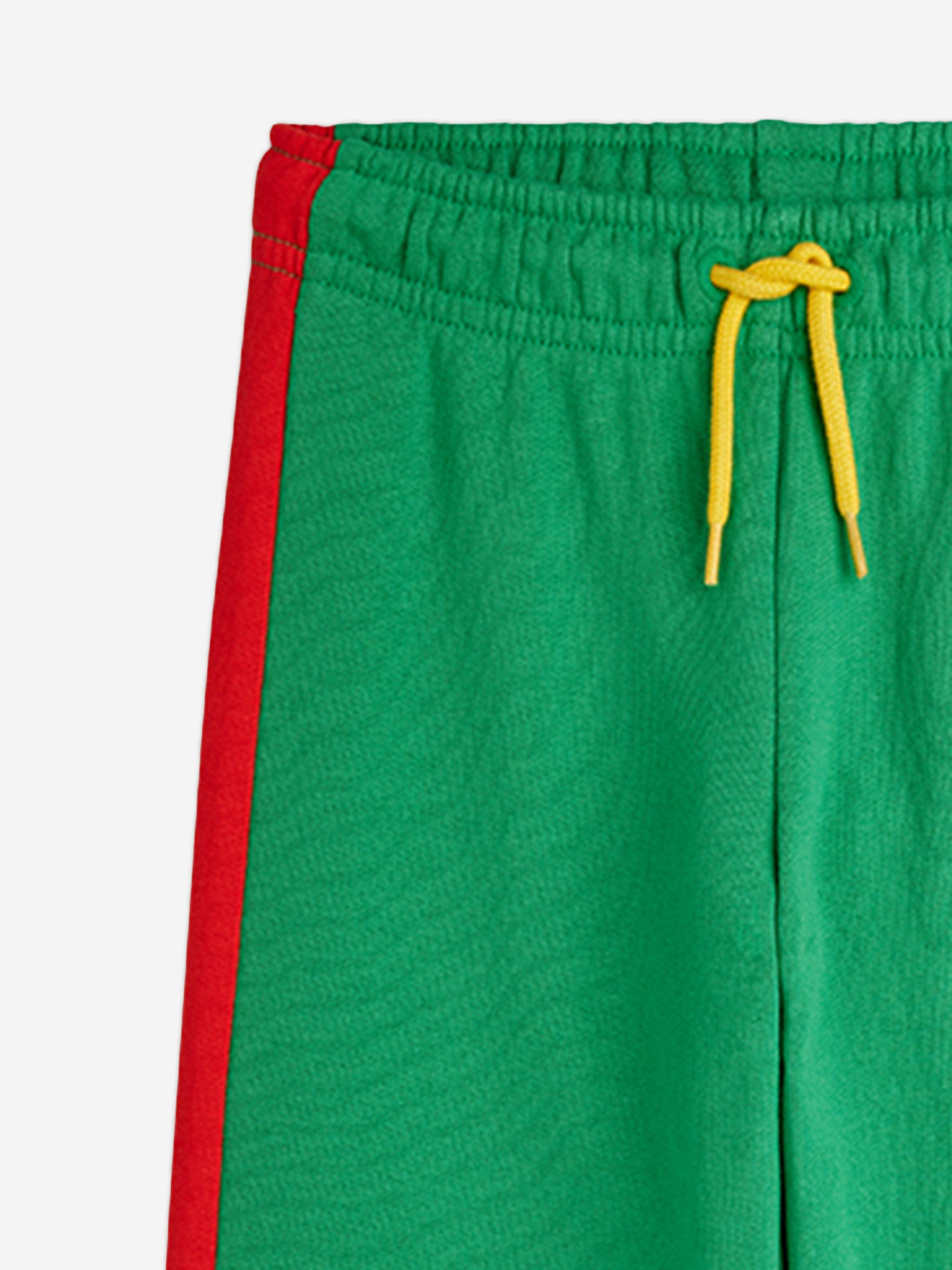 Mini Rodini Kids E.T. Embroidered Joggers in Green