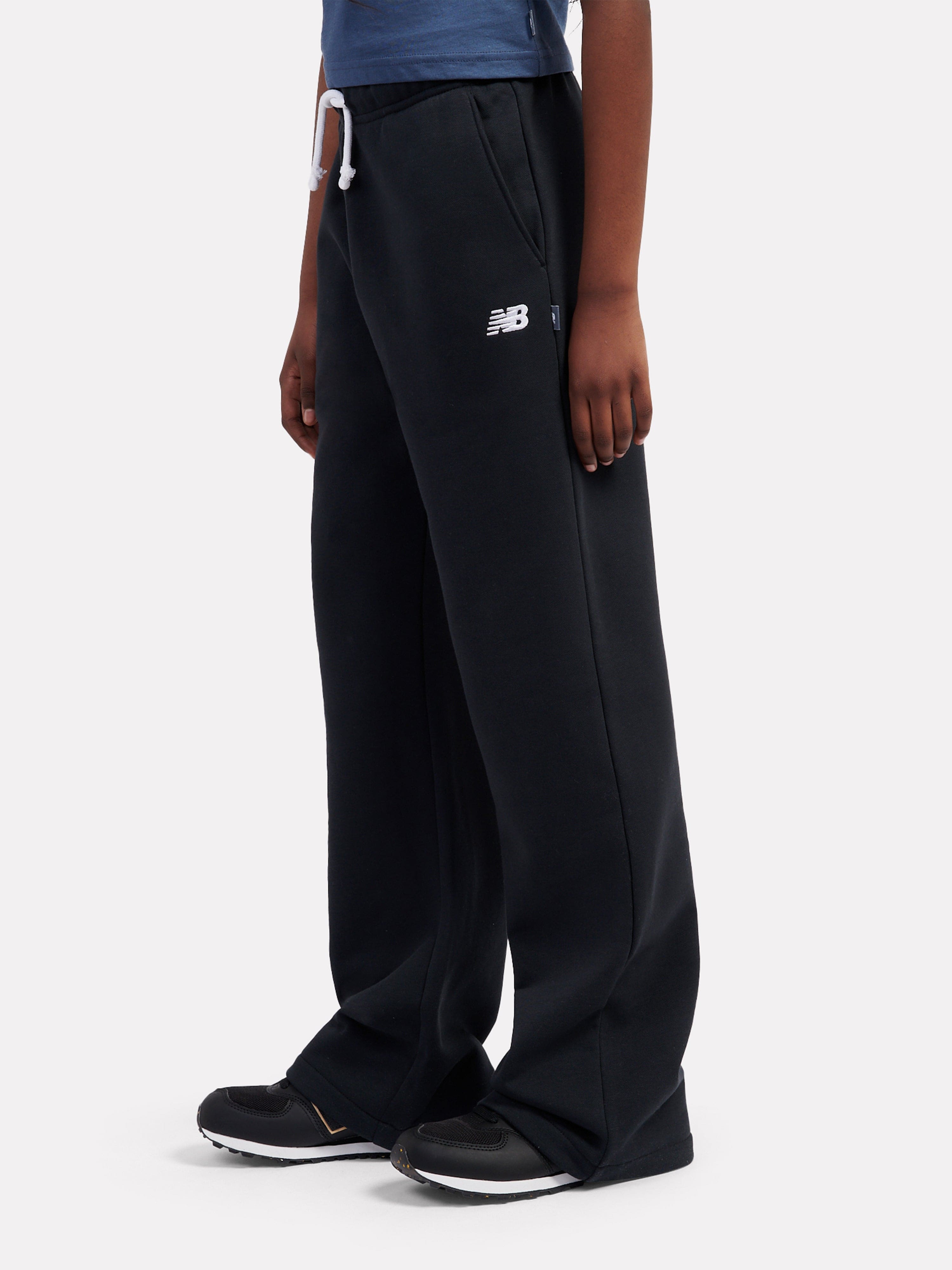 New Balance Girls FT Small Logo Wide Leg Joggers in Black