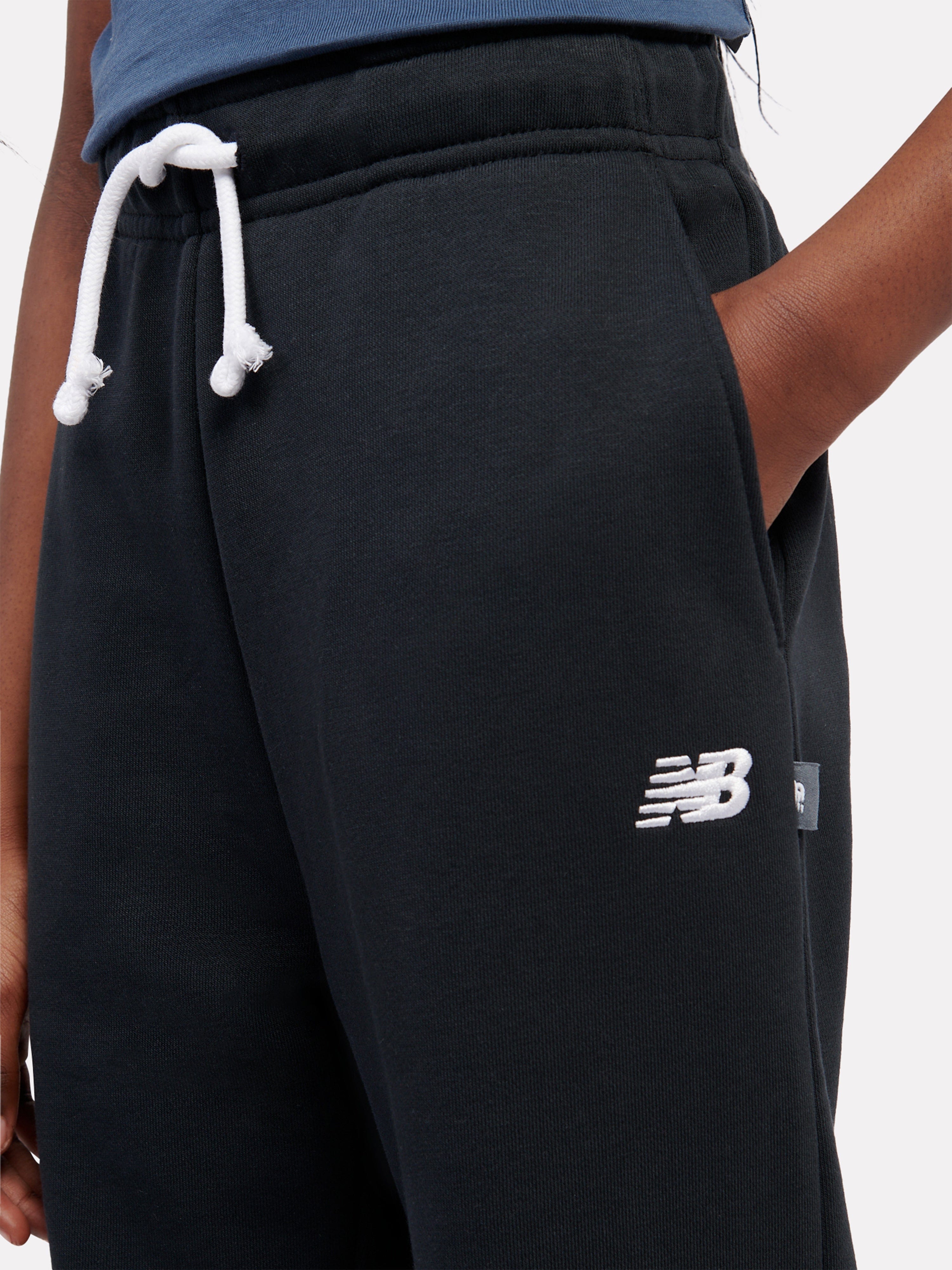 New Balance Girls FT Small Logo Wide Leg Joggers in Black
