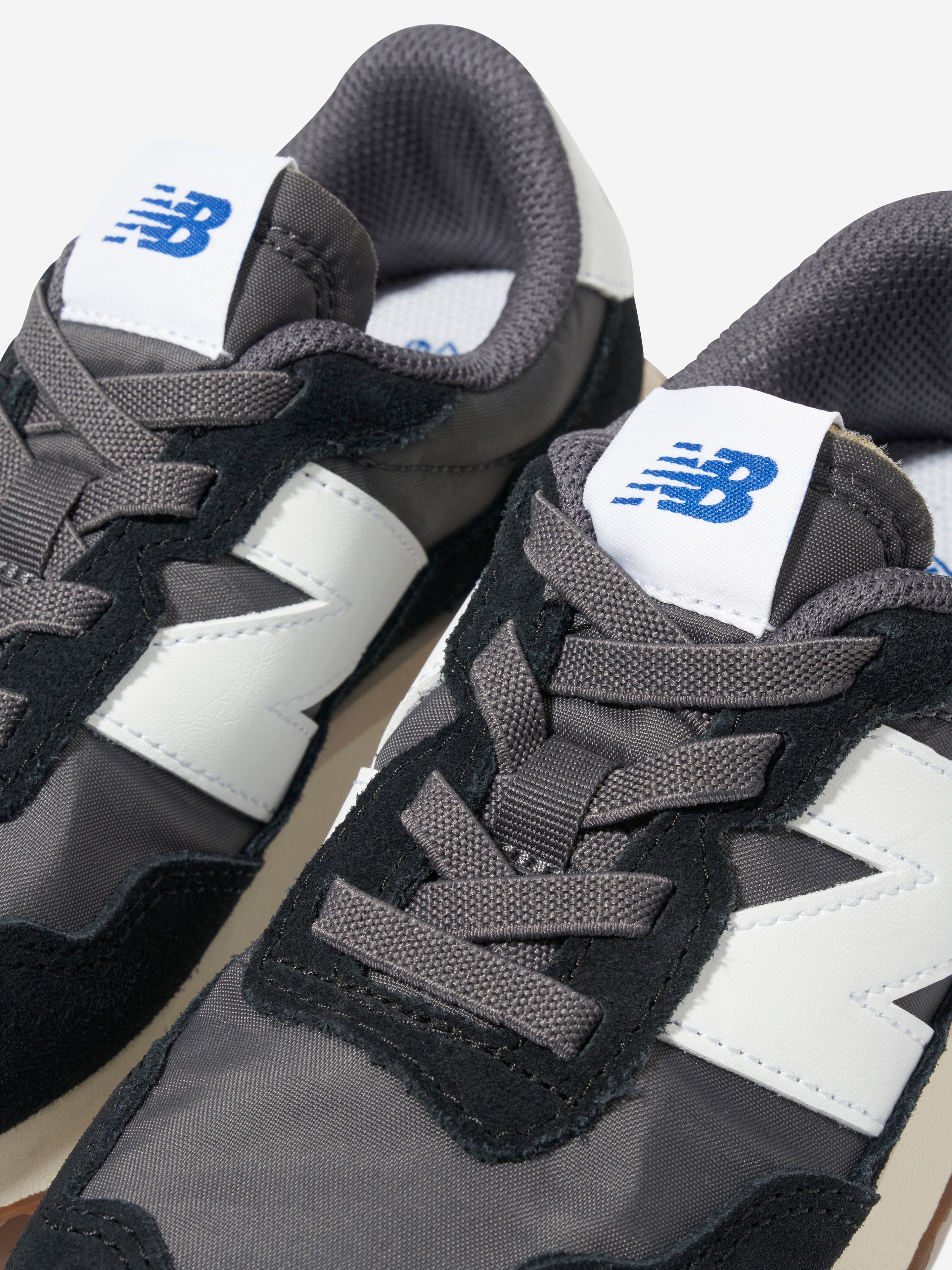 New Balance Kids 237 Lace Up Logo Trainers in Black