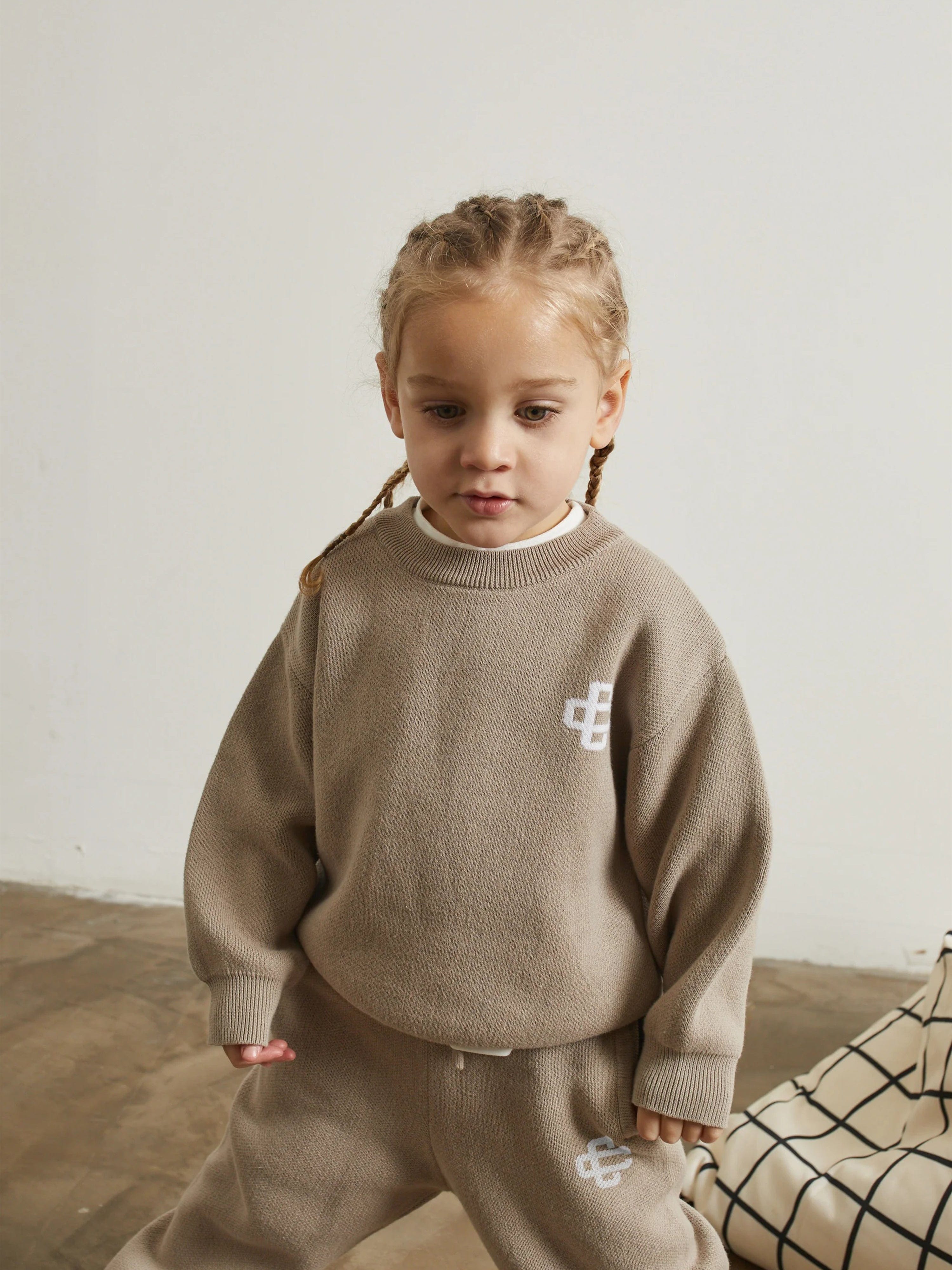 The Couture Club Kids Knitted Emblem Sweatshirt in Beige