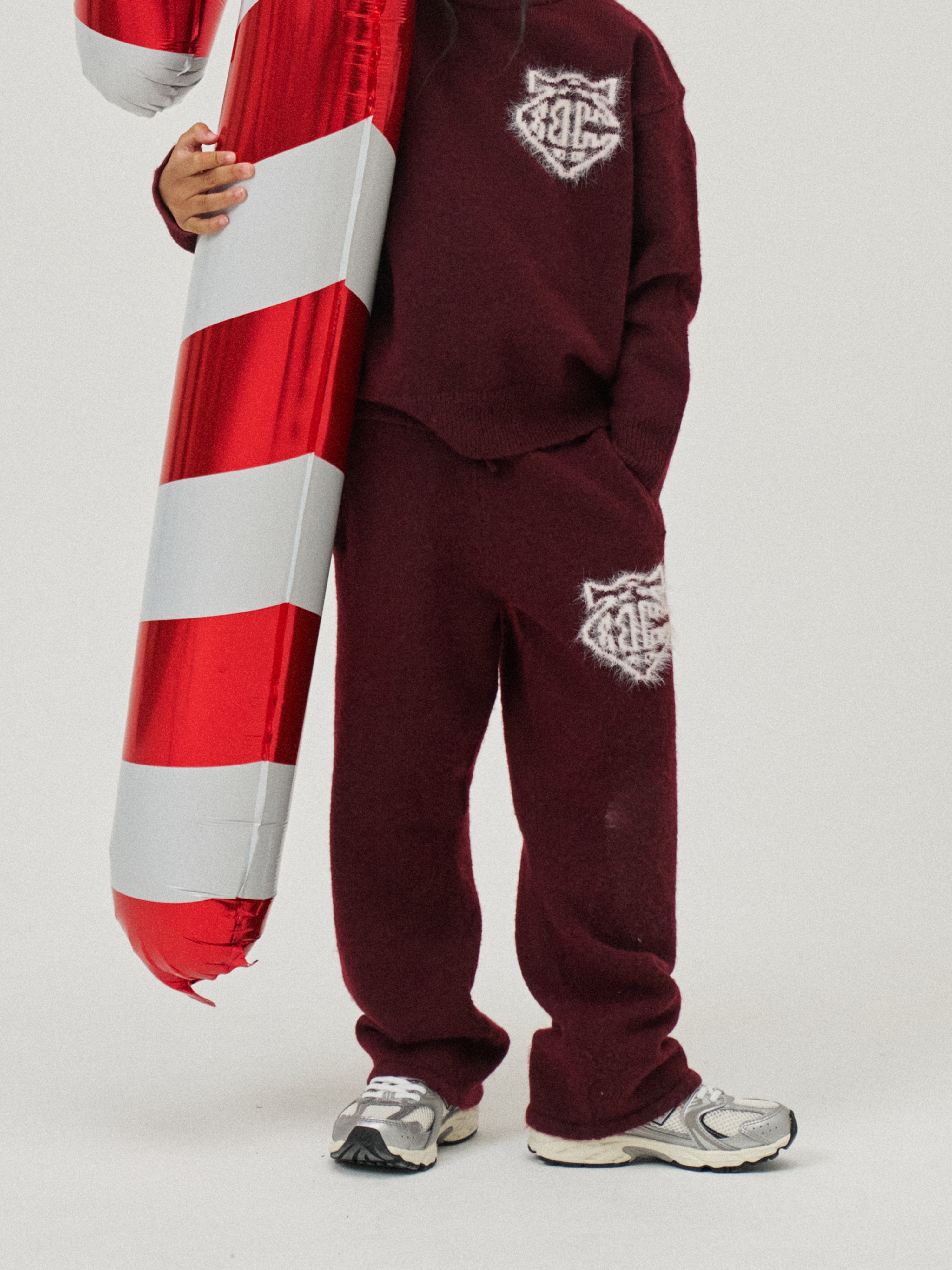 The Couture Club Kids Monogram Emblem Fluffy Knit Joggers in Red